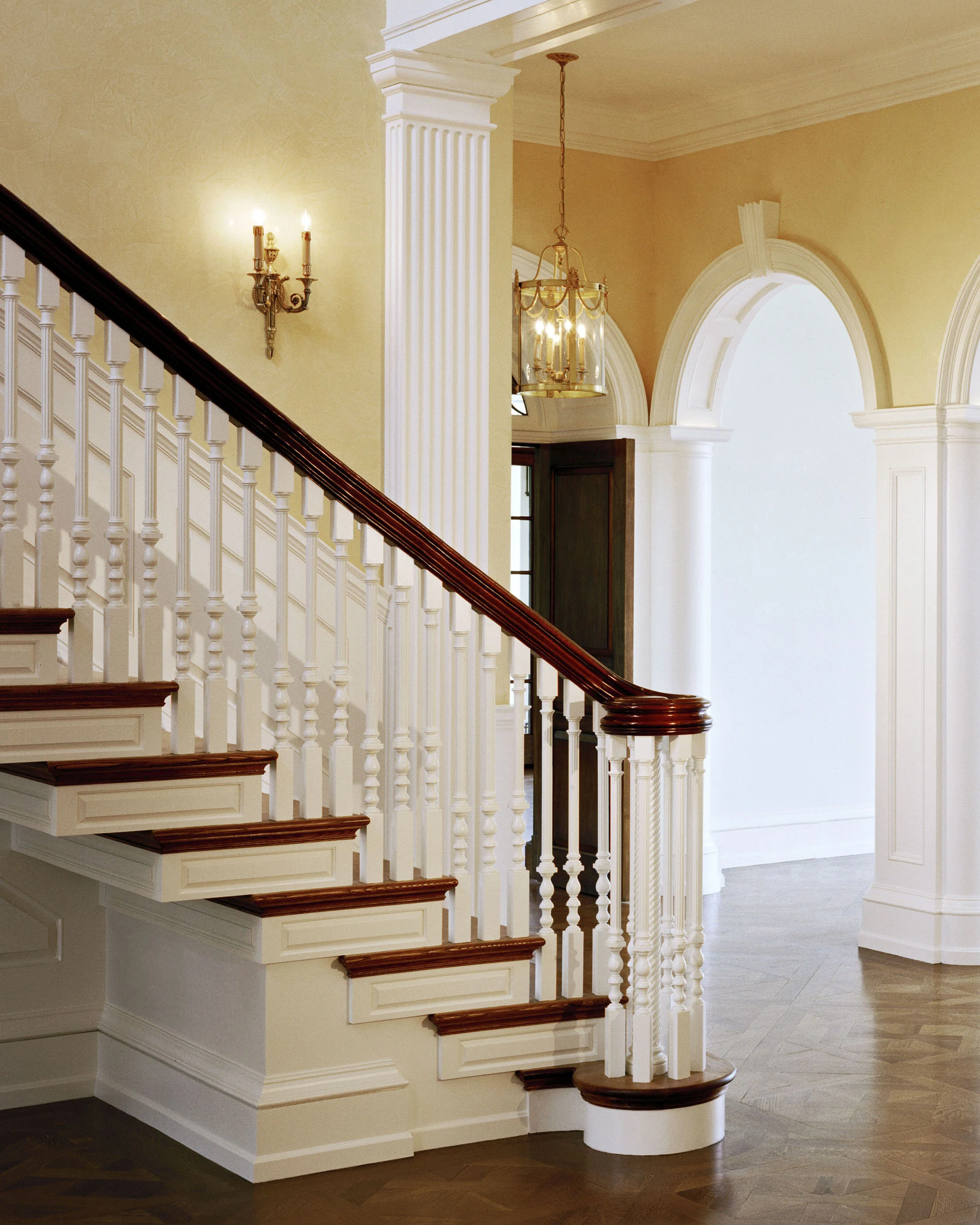 Shingle style home in Greenwich CT, staircase white balusters