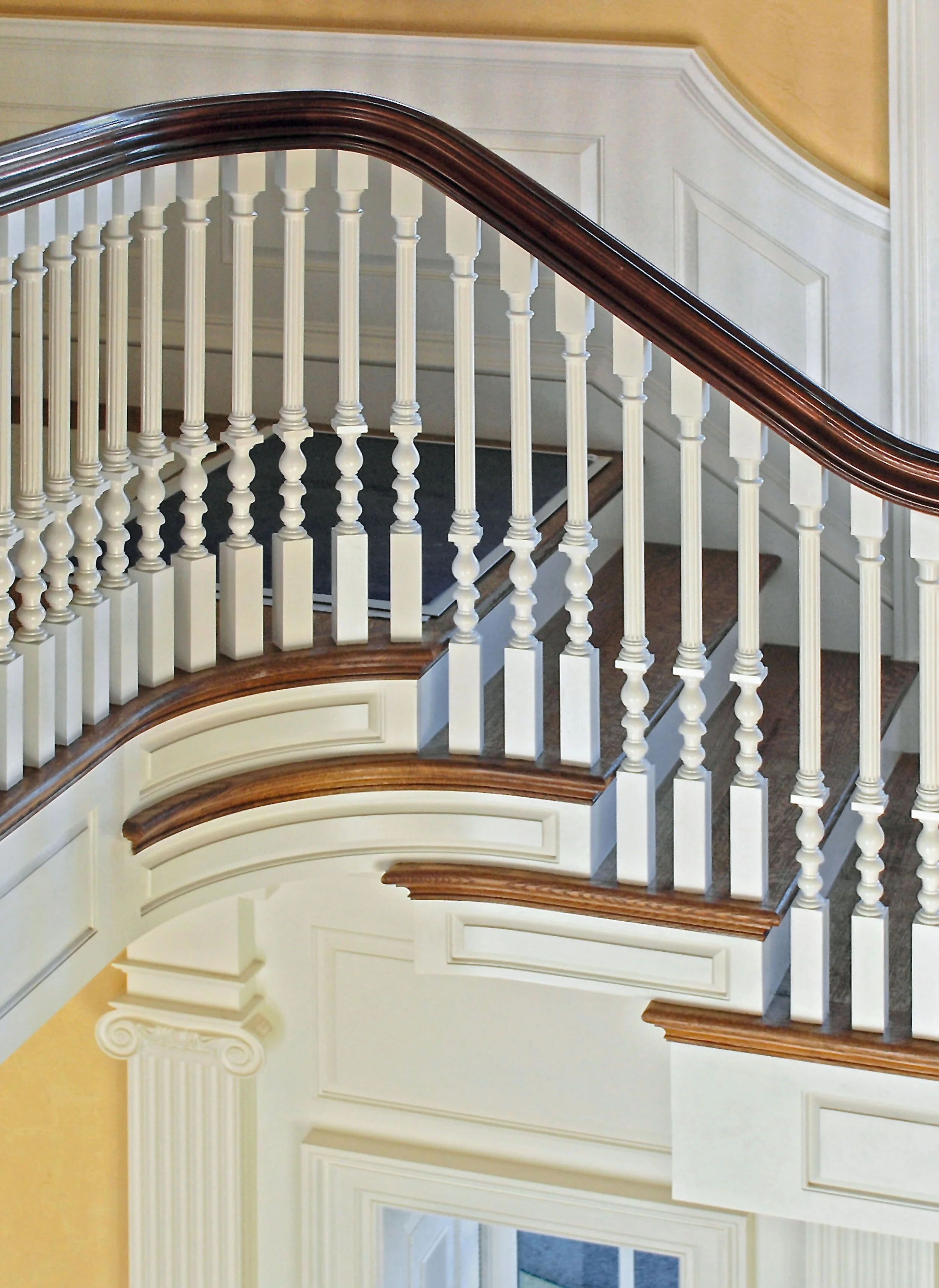 Shingle style home in Greenwich CT, staircase white balusters detail