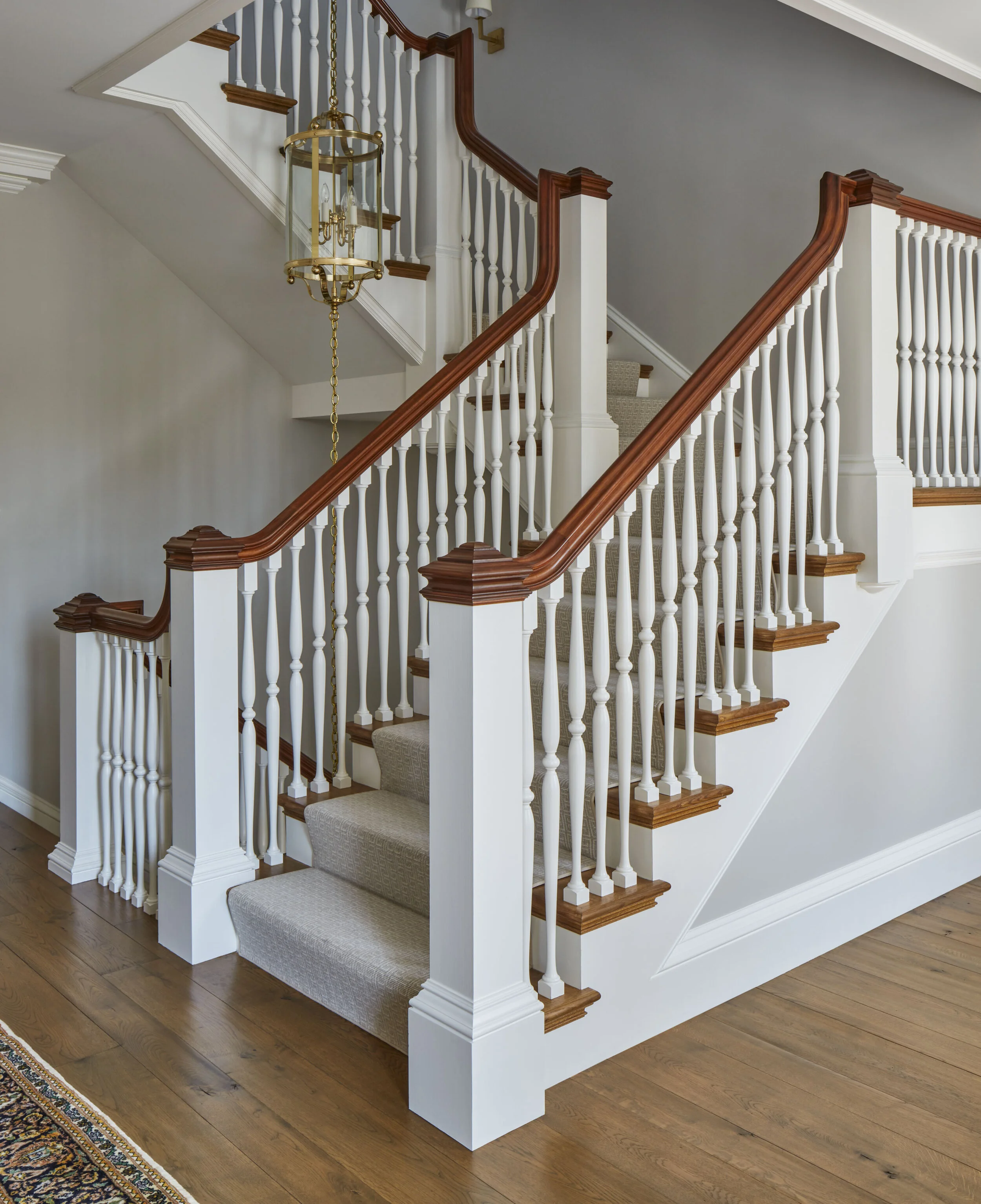 Tudor home in Greenwich CT, staircase carved rail detail