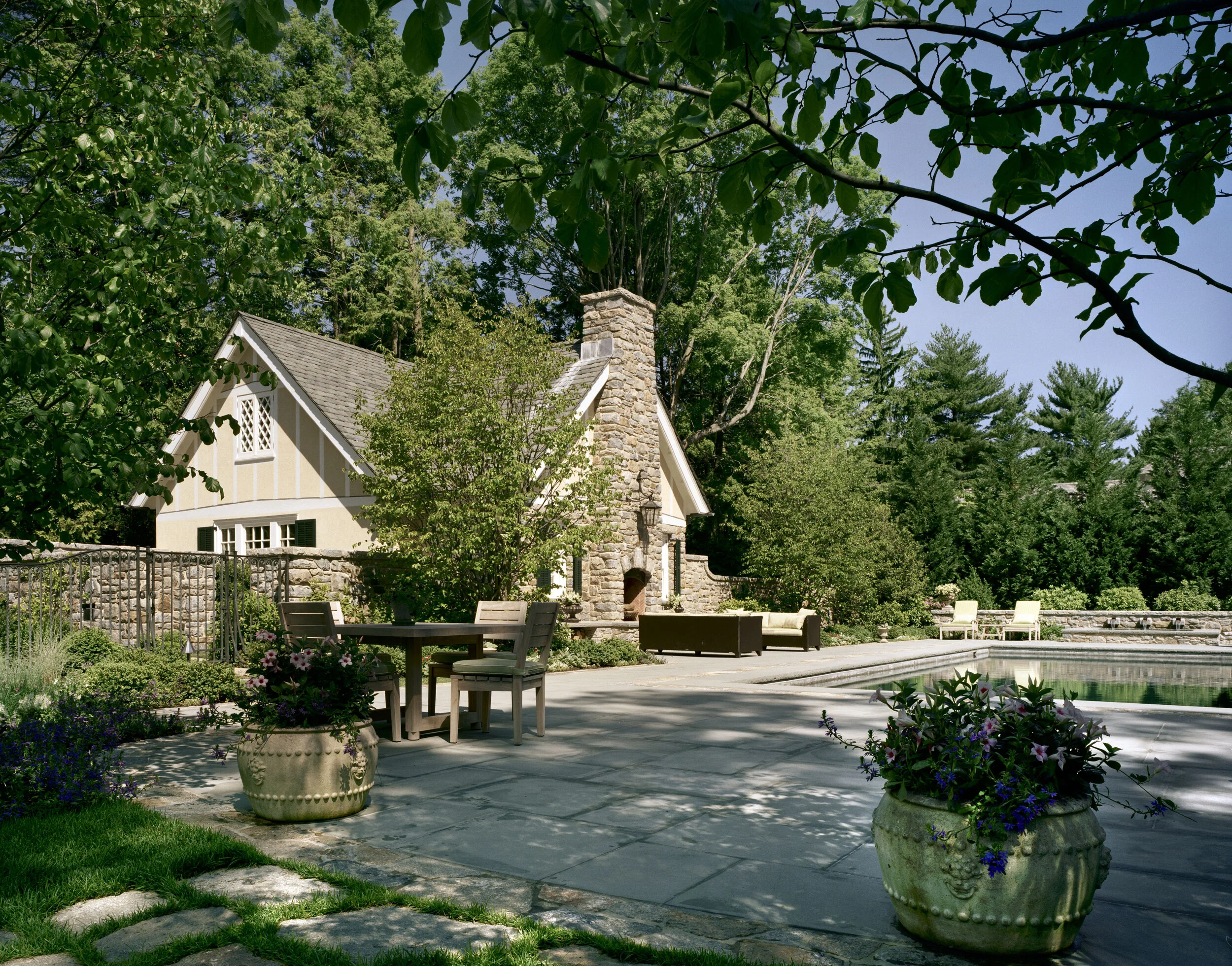 Shingle style home in Greenwich CT, outdoor bluestone patio