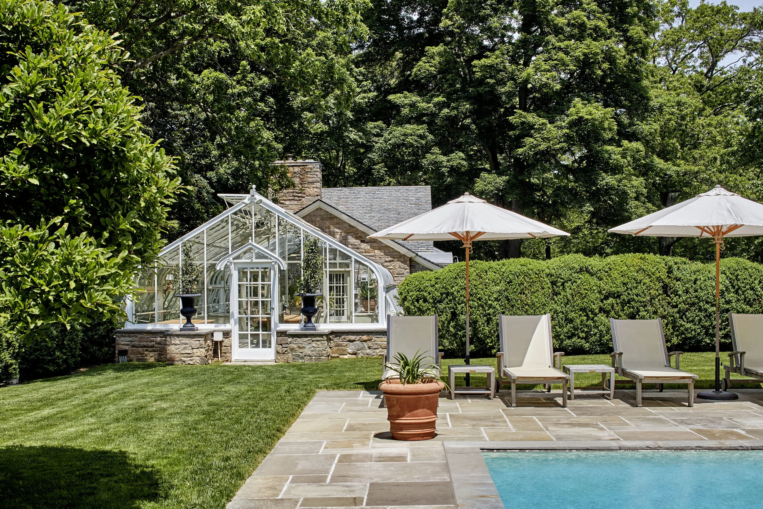 Shingle style home in Greenwich CT, outdoor wrap-around porch