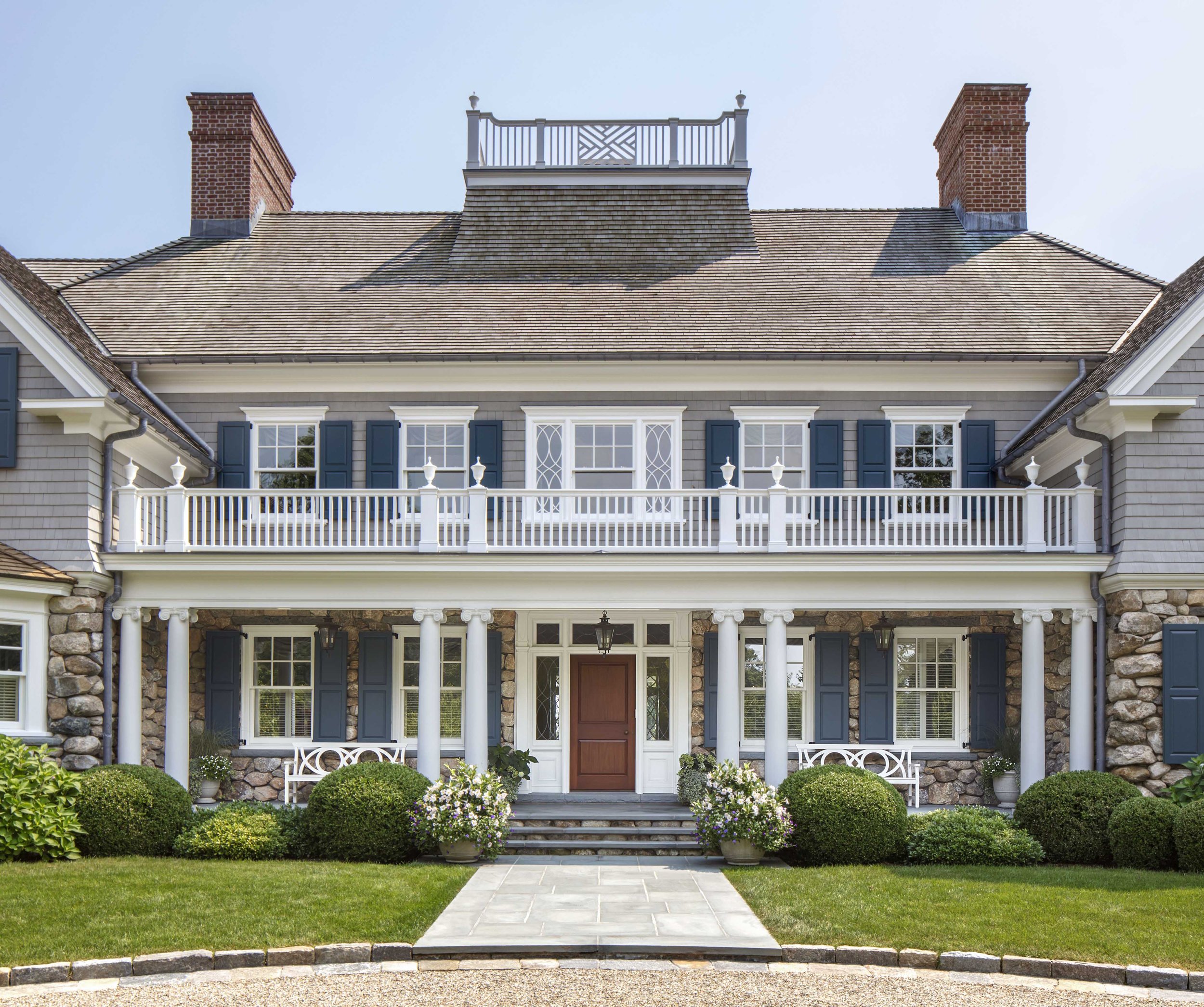 The gables and the second story windows are what make this house