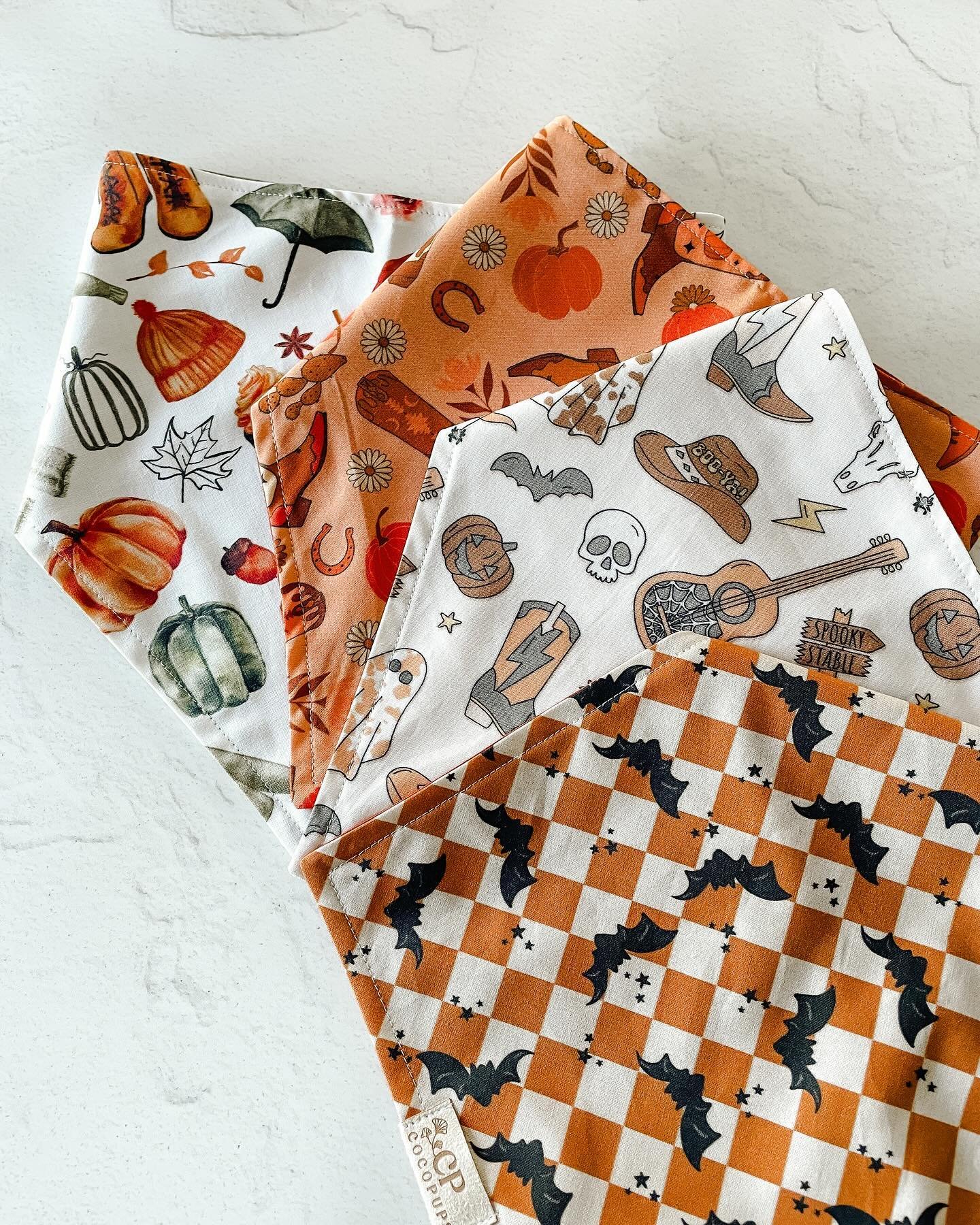 Howdy! Don&rsquo;t miss out on the cutest fall prints! Available online or at @thehenhouse_localmarket 🦇🏁🎃🧣
