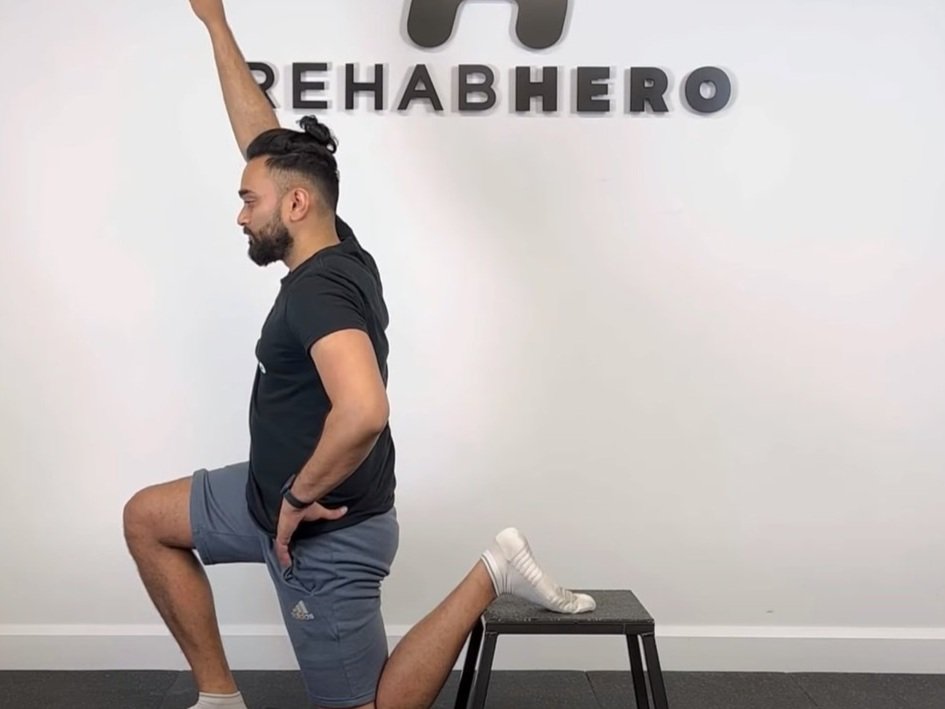 Band Assisted Quadriceps Stretch — Rehab Hero