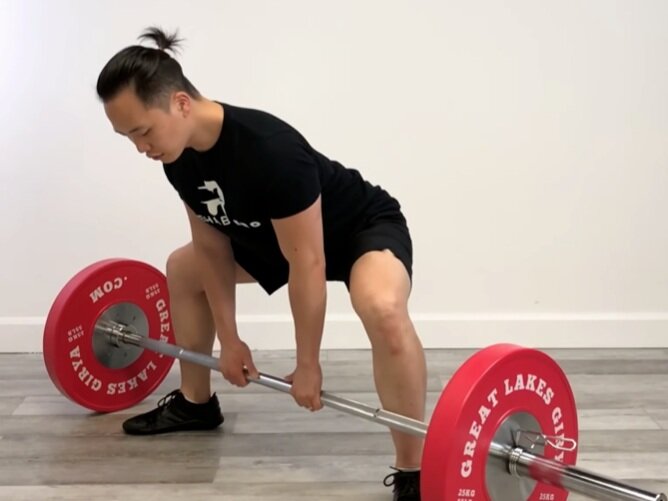 Barbell sumo Romanian deadlift exercise instructions and video