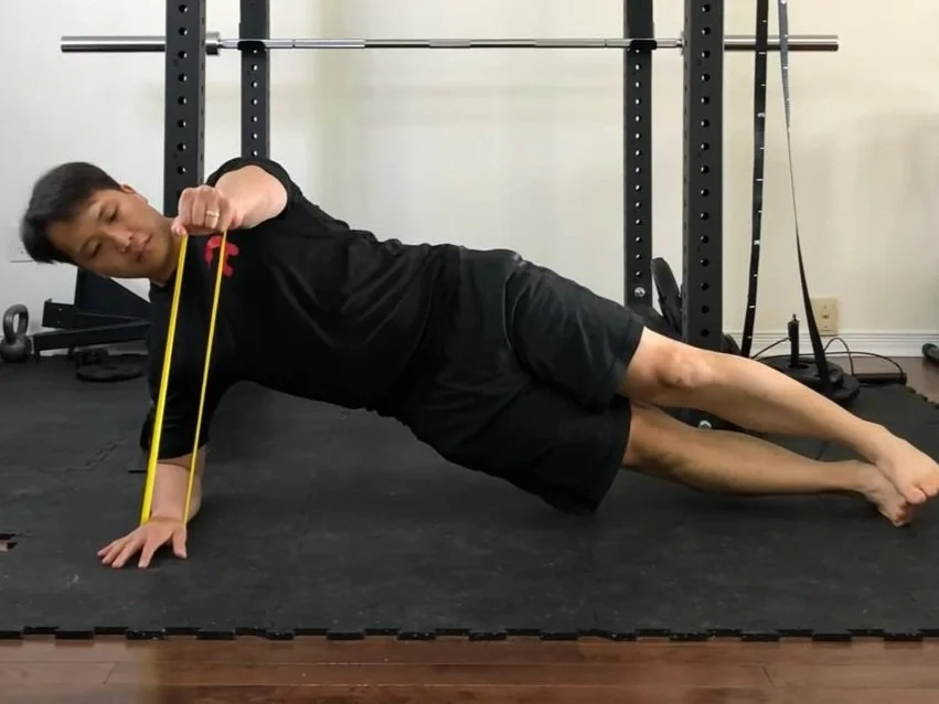 band pull side plank with resistance band