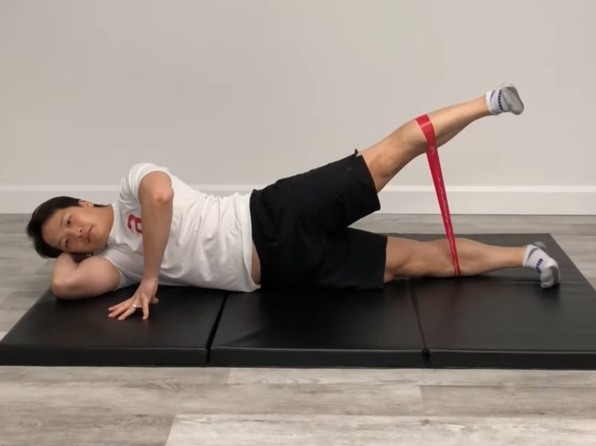 Side Lying Hip Abductions — Hero