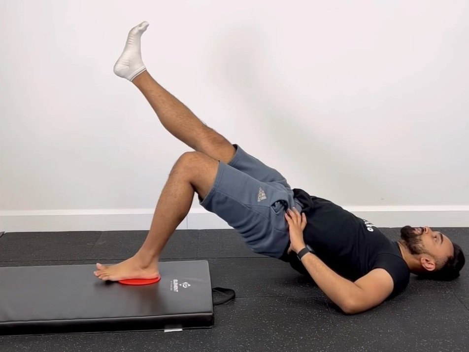 Eccentric Unilateral Hamstring Slider — Rehab Hero