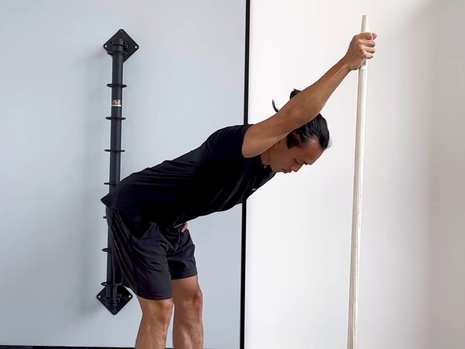 Dowel Lats Stretch — Rehab Hero