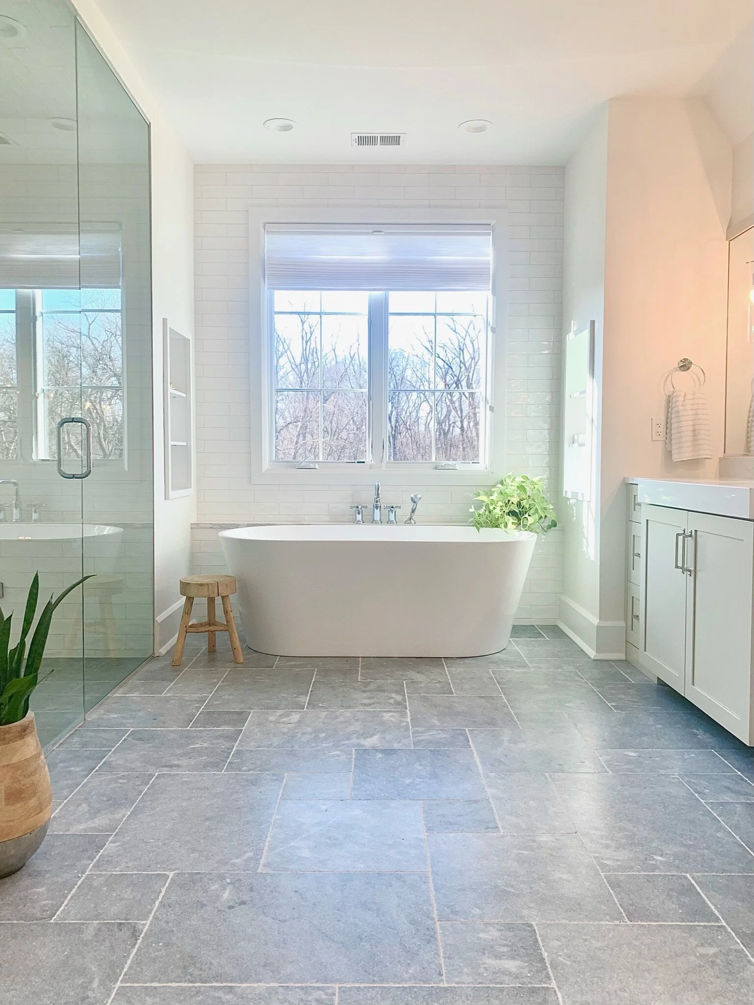 ArtesianDesigns_ bathroom blue marble turkish tile freestanding tub sw useful gray vanity cabinet organic master bath