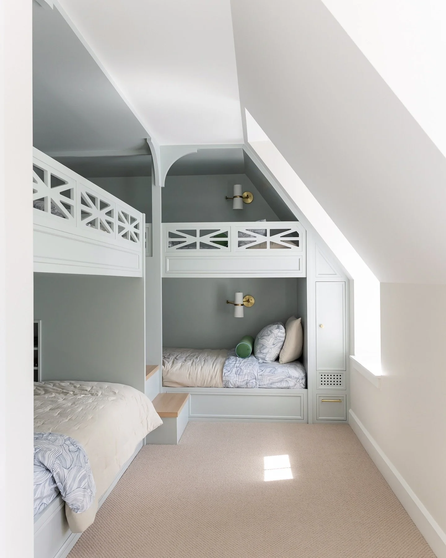 The bunk beds are stacked and ready for duty this holiday weekend 🌊

This dramatic roofline was the biggest design challenge at first&mdash;it limited layout options and made fitting beds a puzzle. But in the end, it became the most charming feature