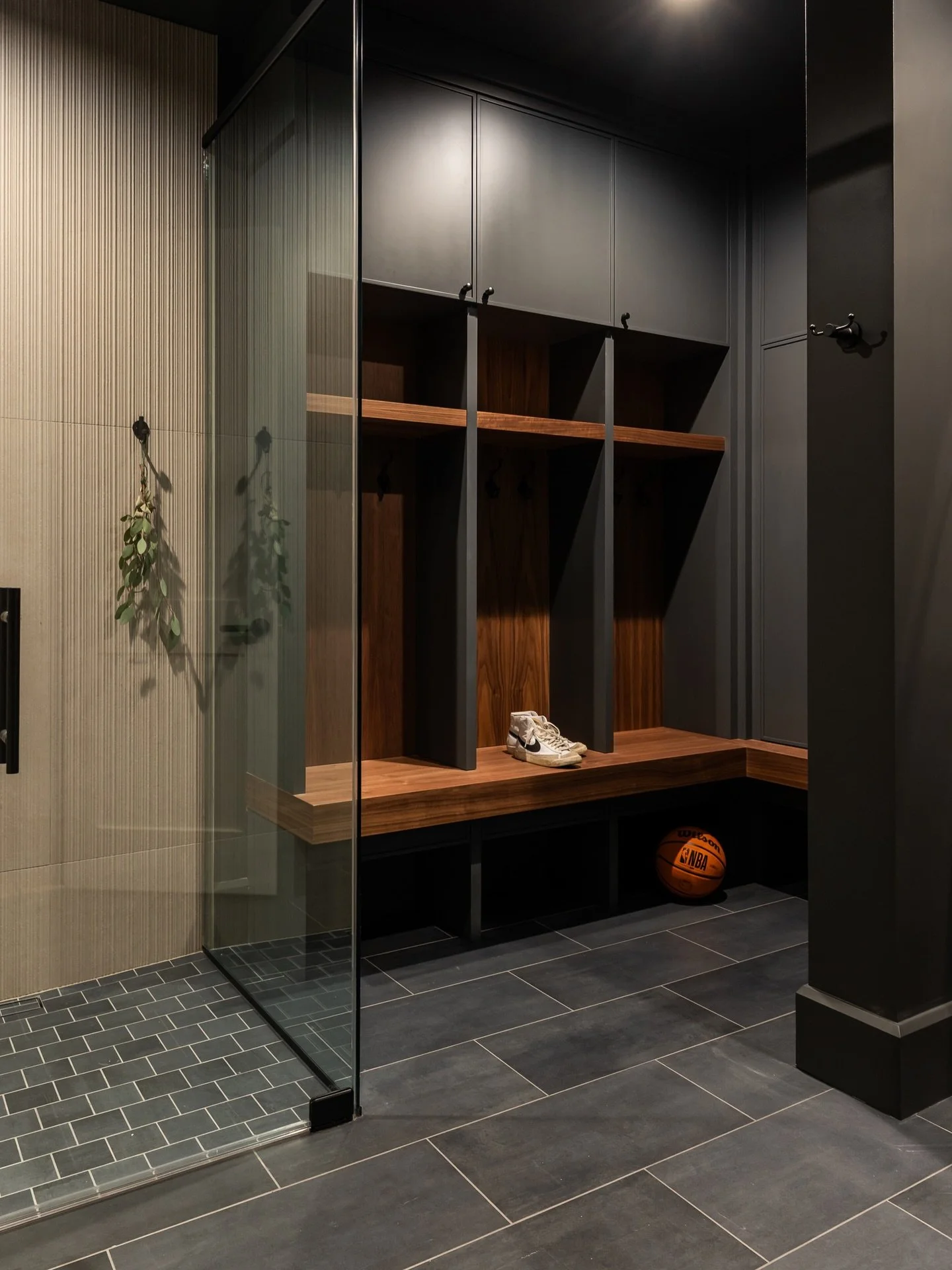 The texture + mood in here are just 🤌🤌

This is the perfect place to unwind after getting in a workout, shooting some hoops - or watching your bracket bust in real time. 

The custom concrete vanity with integrated sink (😮&zwj;💨) set the tone and