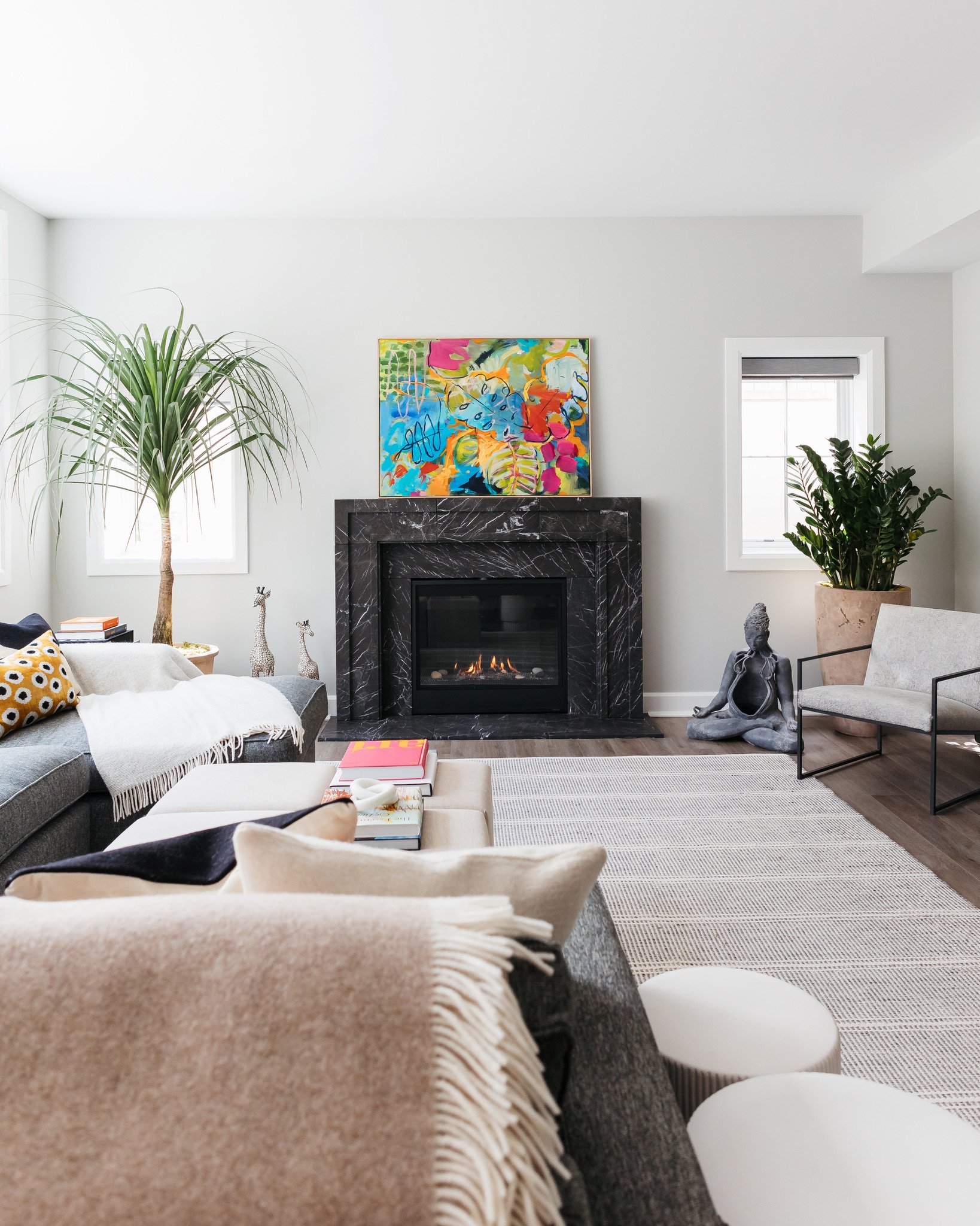 artesian-designs_basement_living_marble_fireplace_nero.jpg