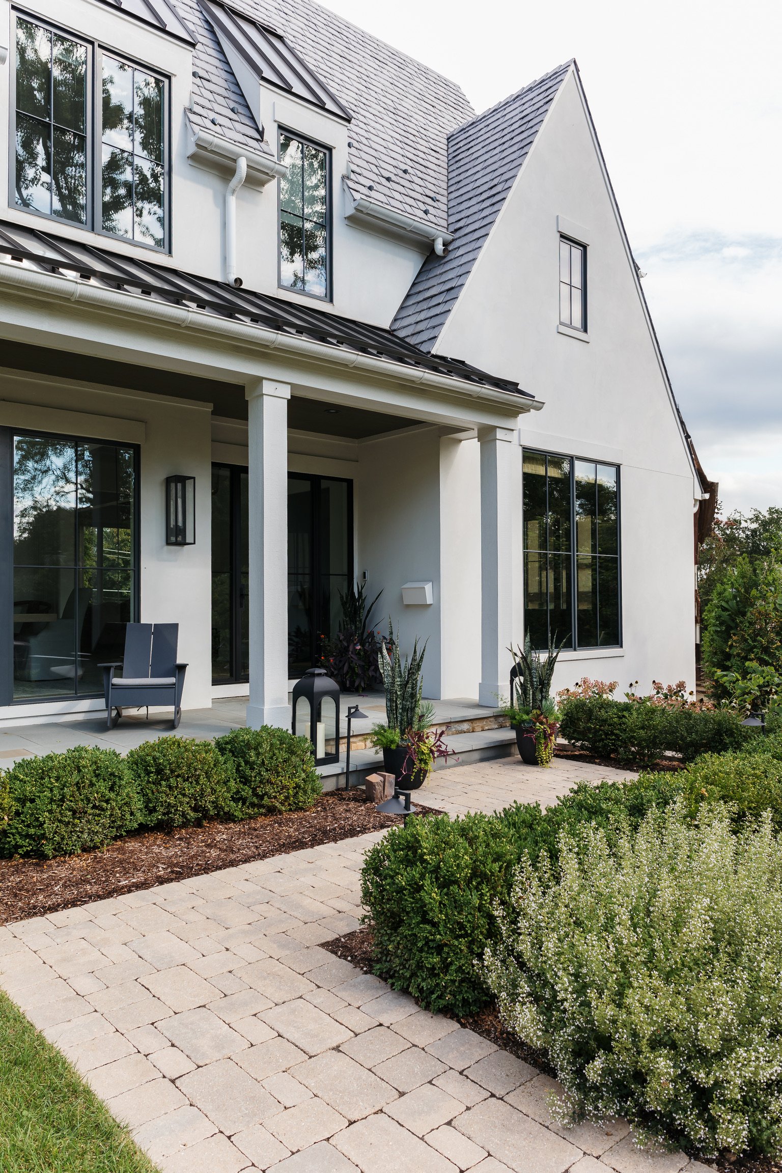 artesian_Designs_stucco_exterior_slate_roof.jpg