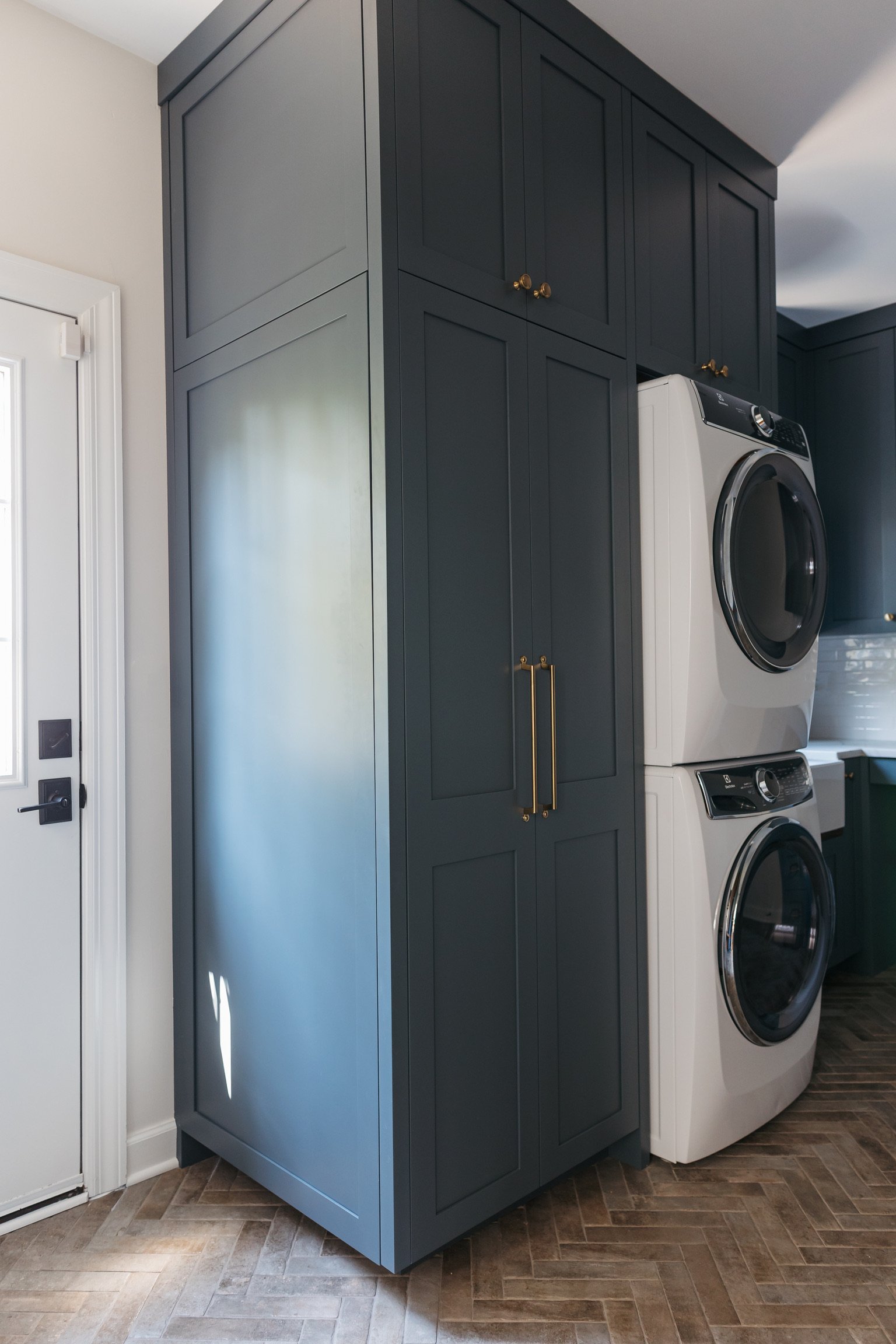 mudroom-reno-herringbone-brick-device-cabinet-hidden.jpg
