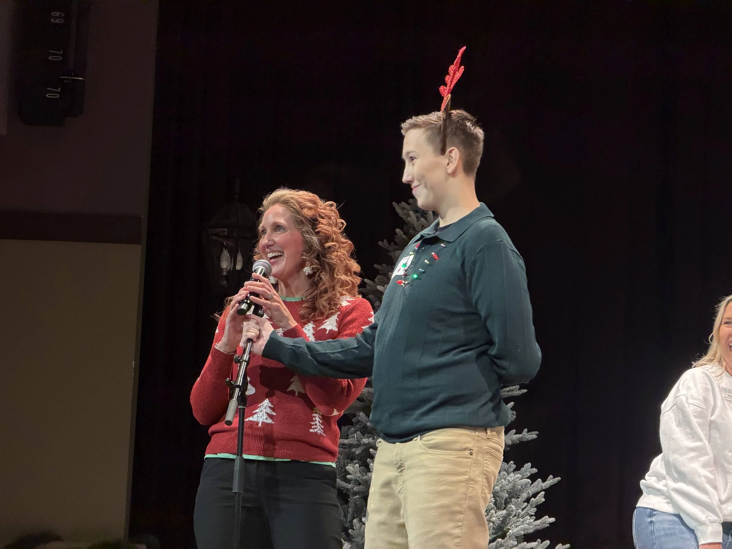 Melissa singing with a male student