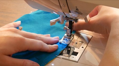 Sew the seam at 1/4” seam allowance. Here, we marked the seam line and use a general-purpose presser foot.