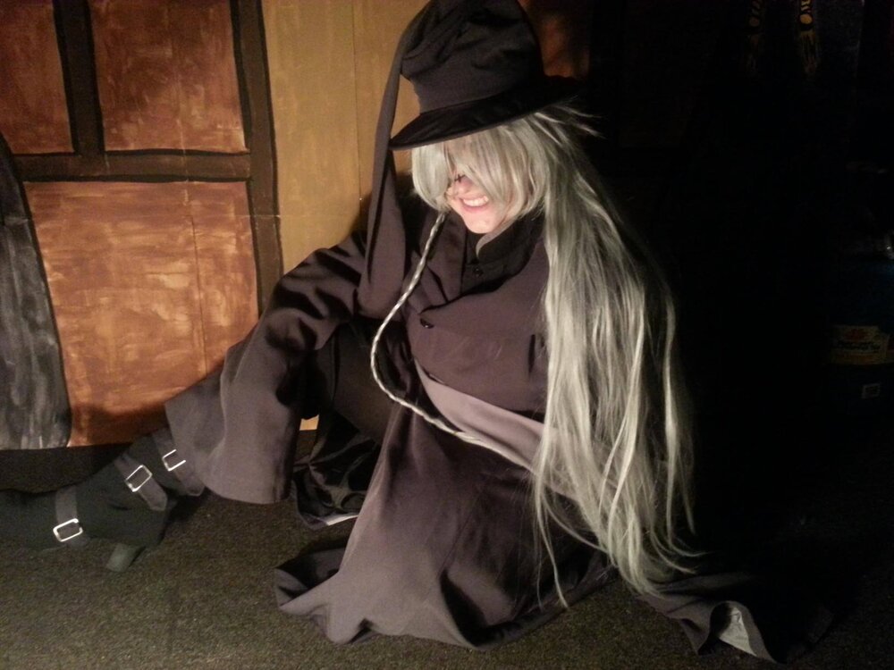 Reila as Undertaker (female cosplaying as male) from Black Butler.
