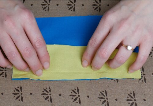 Fold the binding at the seam towards the seam allowance.