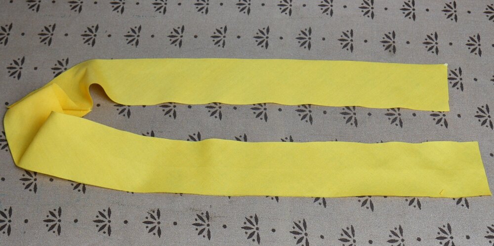 The finished, now single, long strip of bias binding.