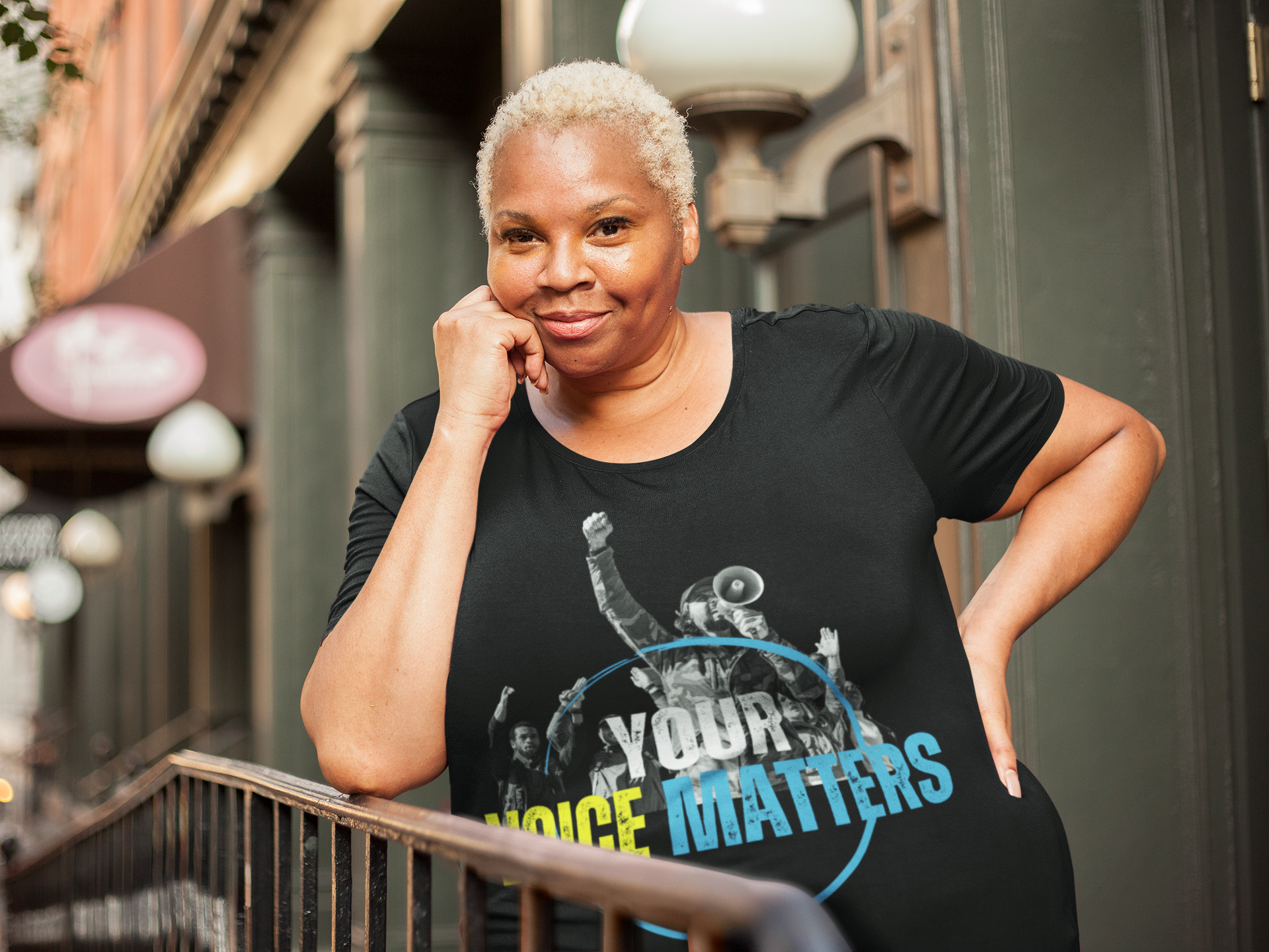 mockup-of-a-woman-wearing-a-plus-size-t-shirt-leaning-her-elbow-on-a-rail-22569.png
