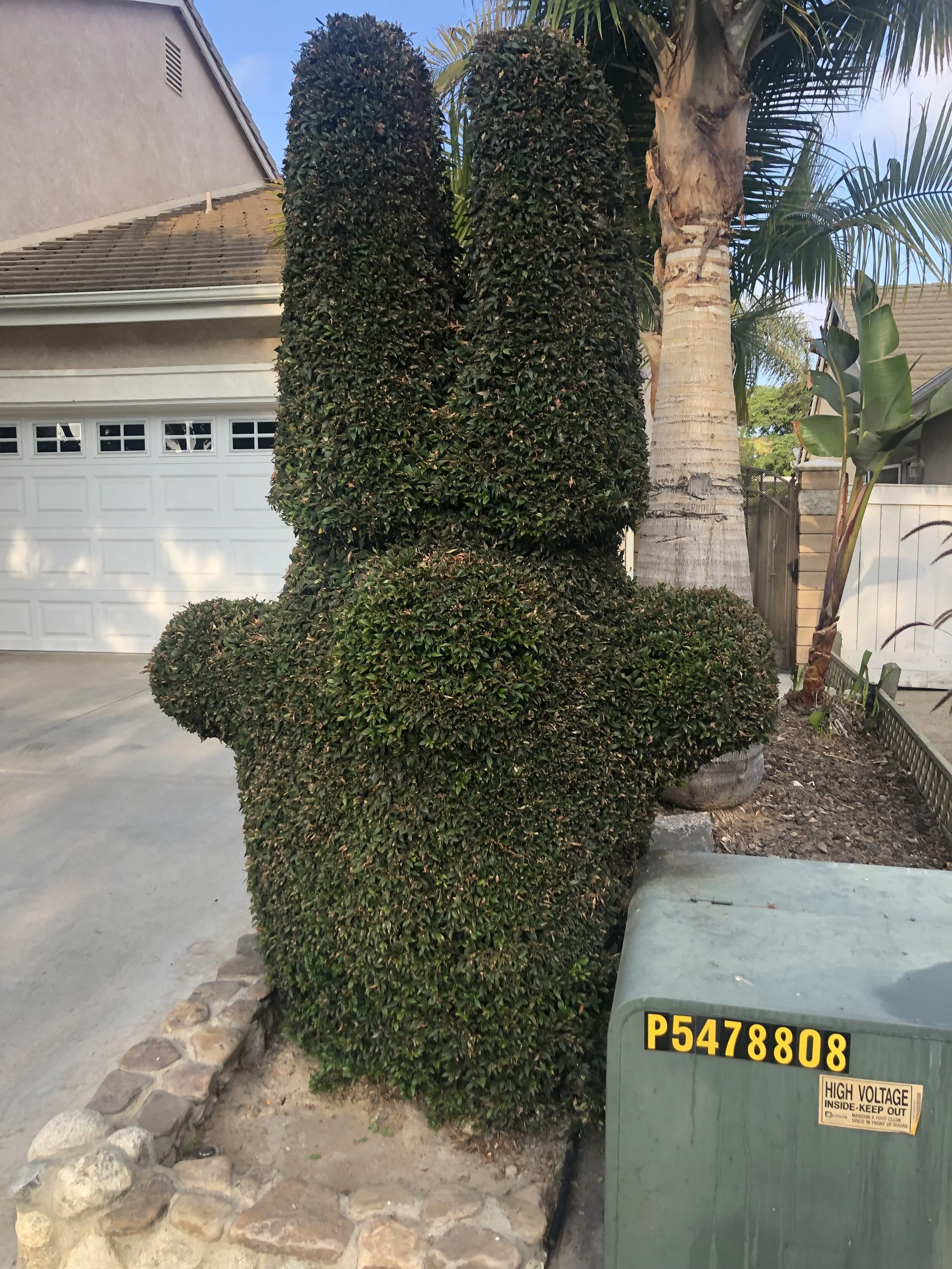 wtf is this? Stumbled upon it in a neighbor’s yard. I’m guessing an Among Us dude with bunny ears? Great effort whatever this is