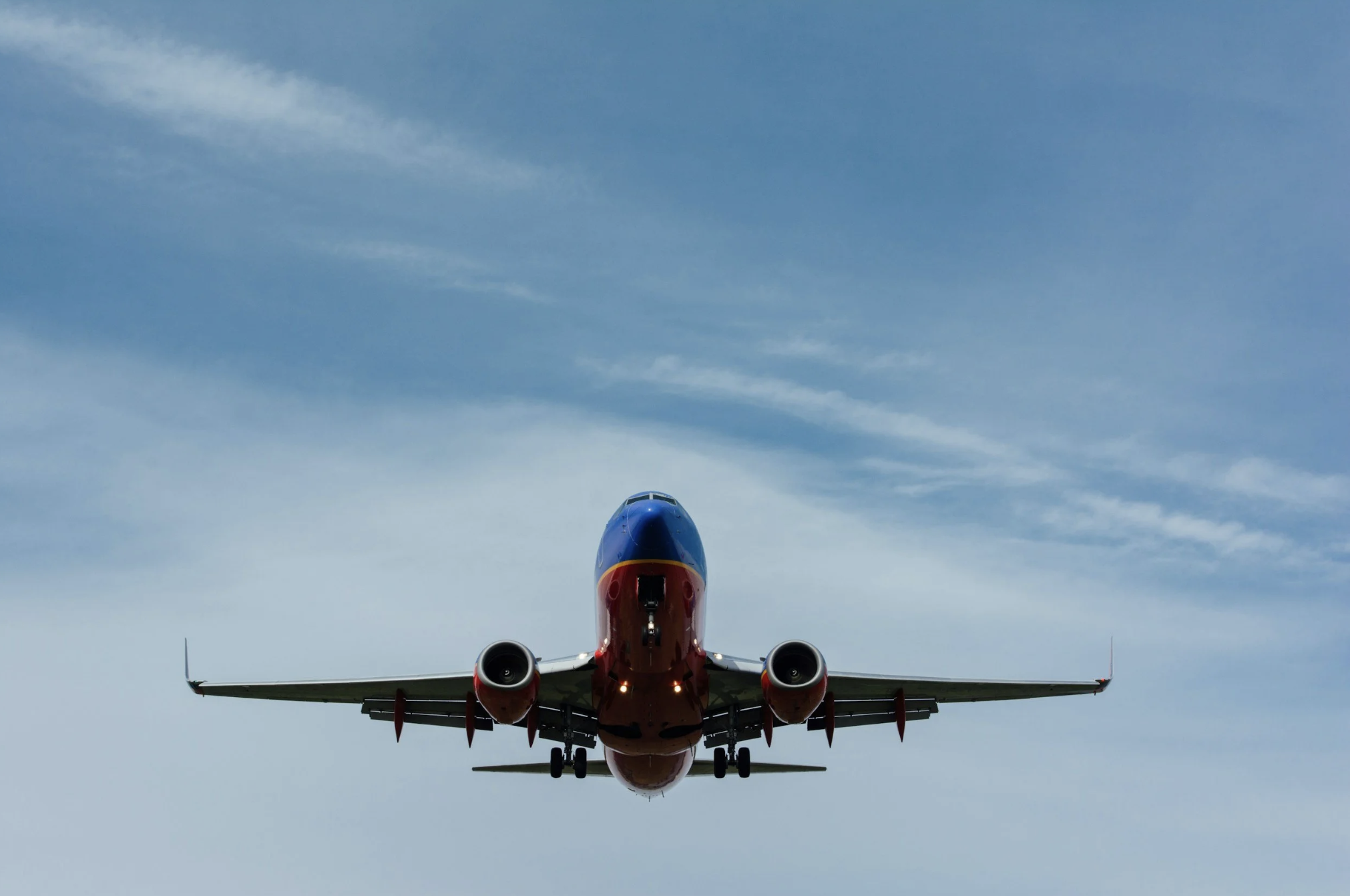 Airplane taking off from the runway, representing the beginning of a well-planned trip.