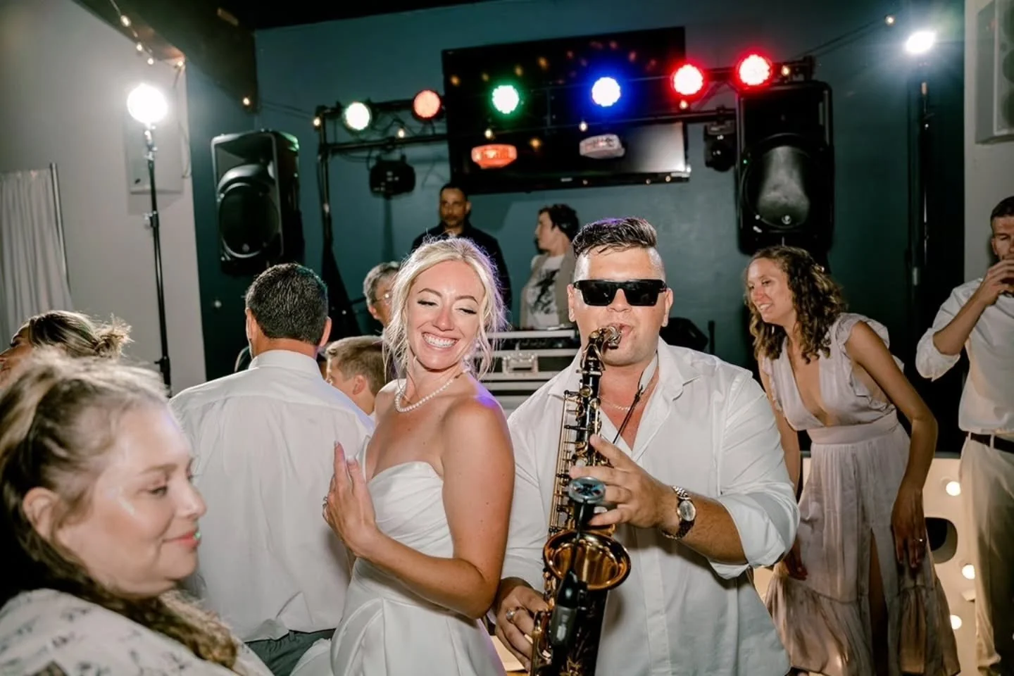 When you bring in a live saxophonist, you can pretty much assume that you're going to have an amazing dance party and endless fun for your guests.
K&B wanted a live saxophone for their wedding day so Tim played Kasey's ceremony processional song