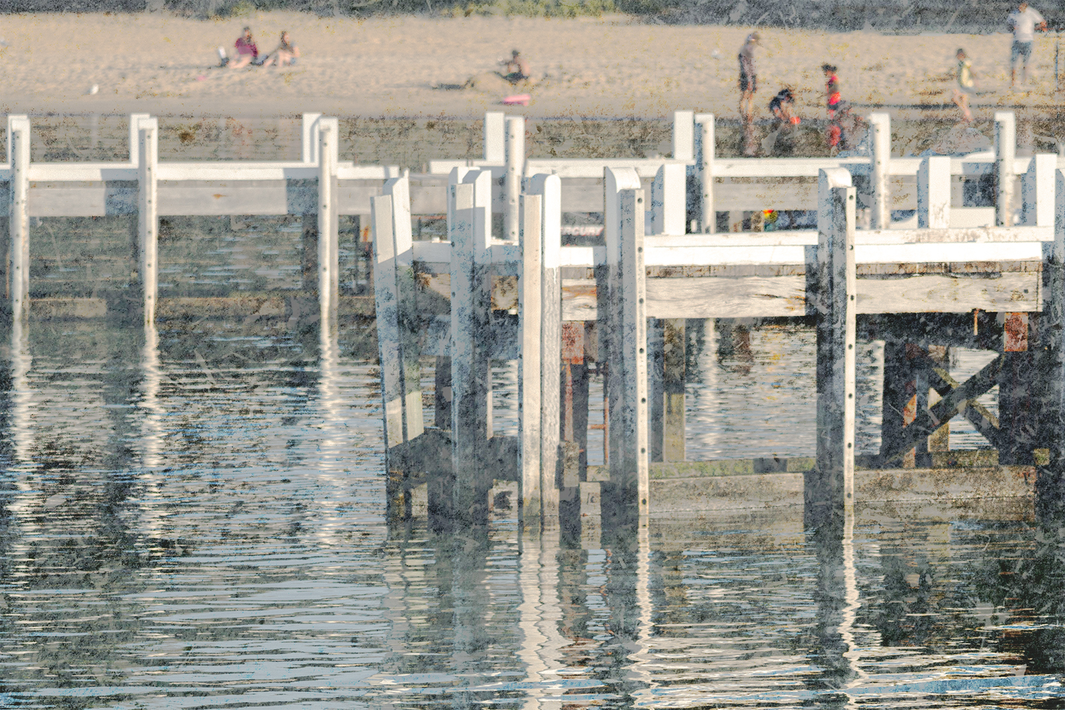 Colour photograph of seaside pier with a French Impressionist painterly effect.