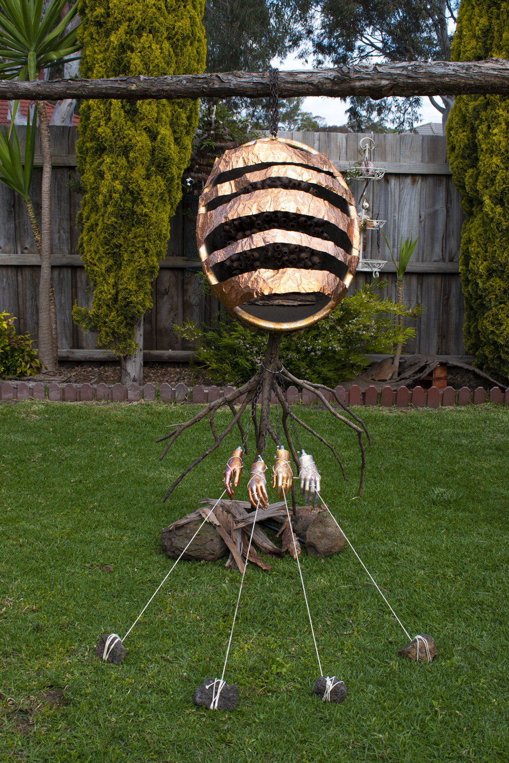 orb like structure of found natural materials/ recycled copper 
