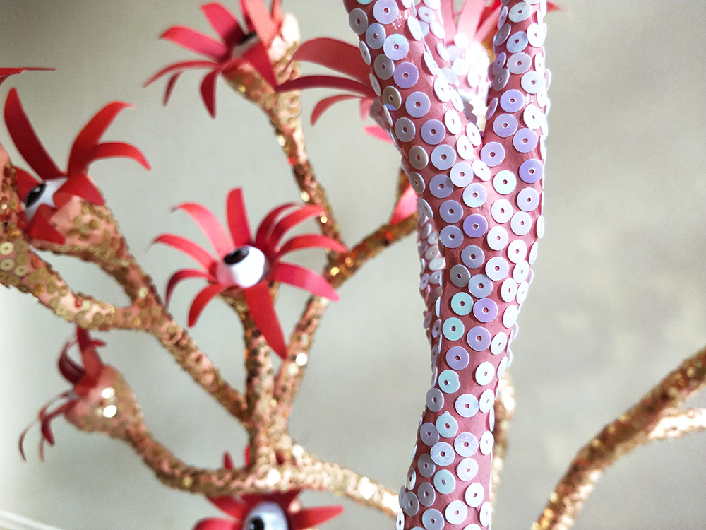 Standing sequined pink orange corals with flowers and eyes