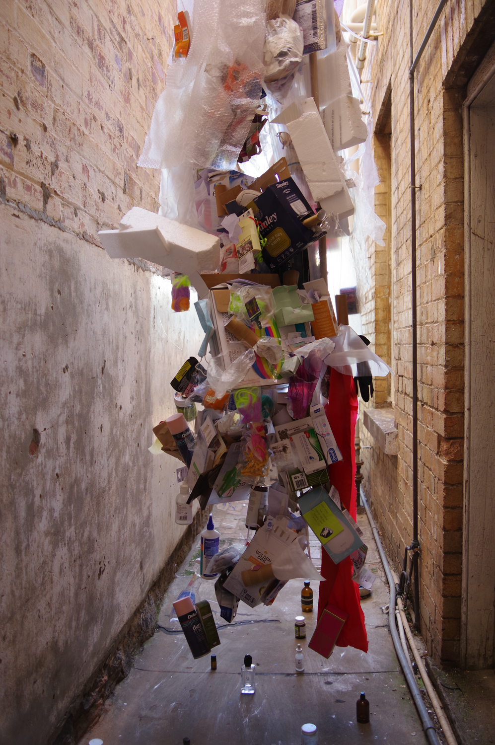 Photo of rubbish with daylight behind it.