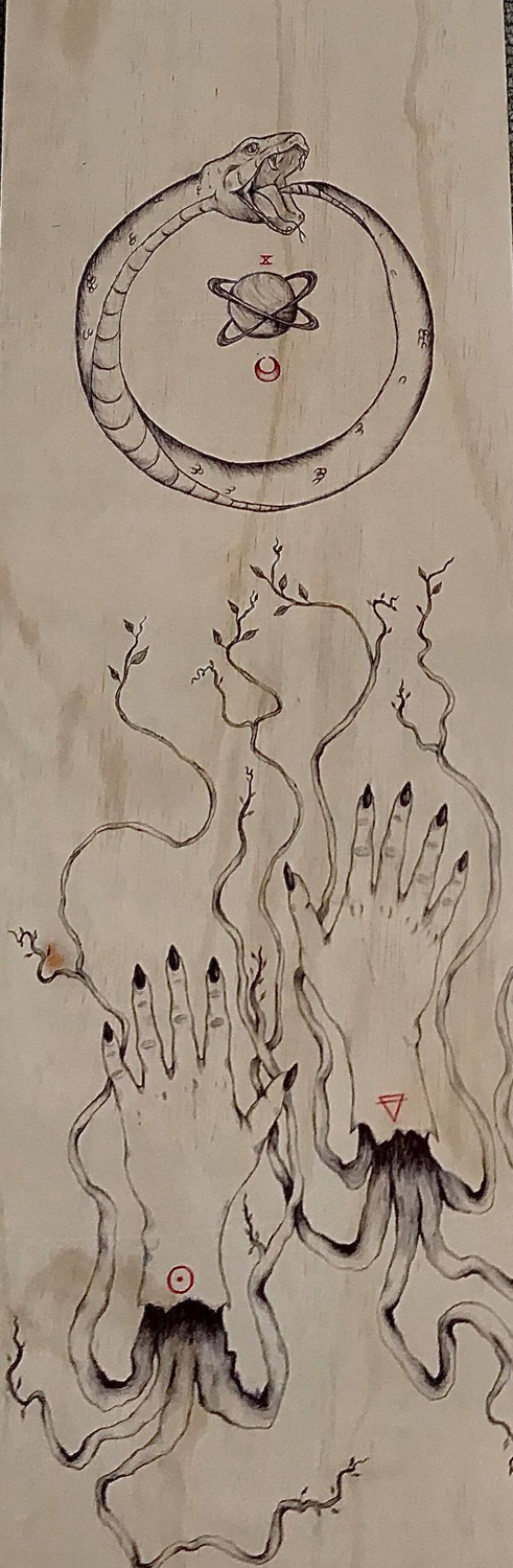 hands with roots coming out of the bottom, roots growing to the top of the work, top of the work has a snake eating its own tail with a planet inside the negative space of the snake 