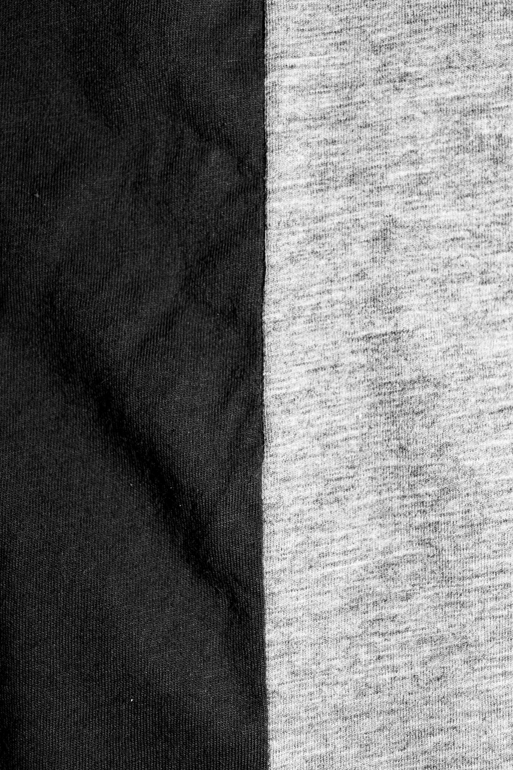 Black and white macro image of two-toned textile. 