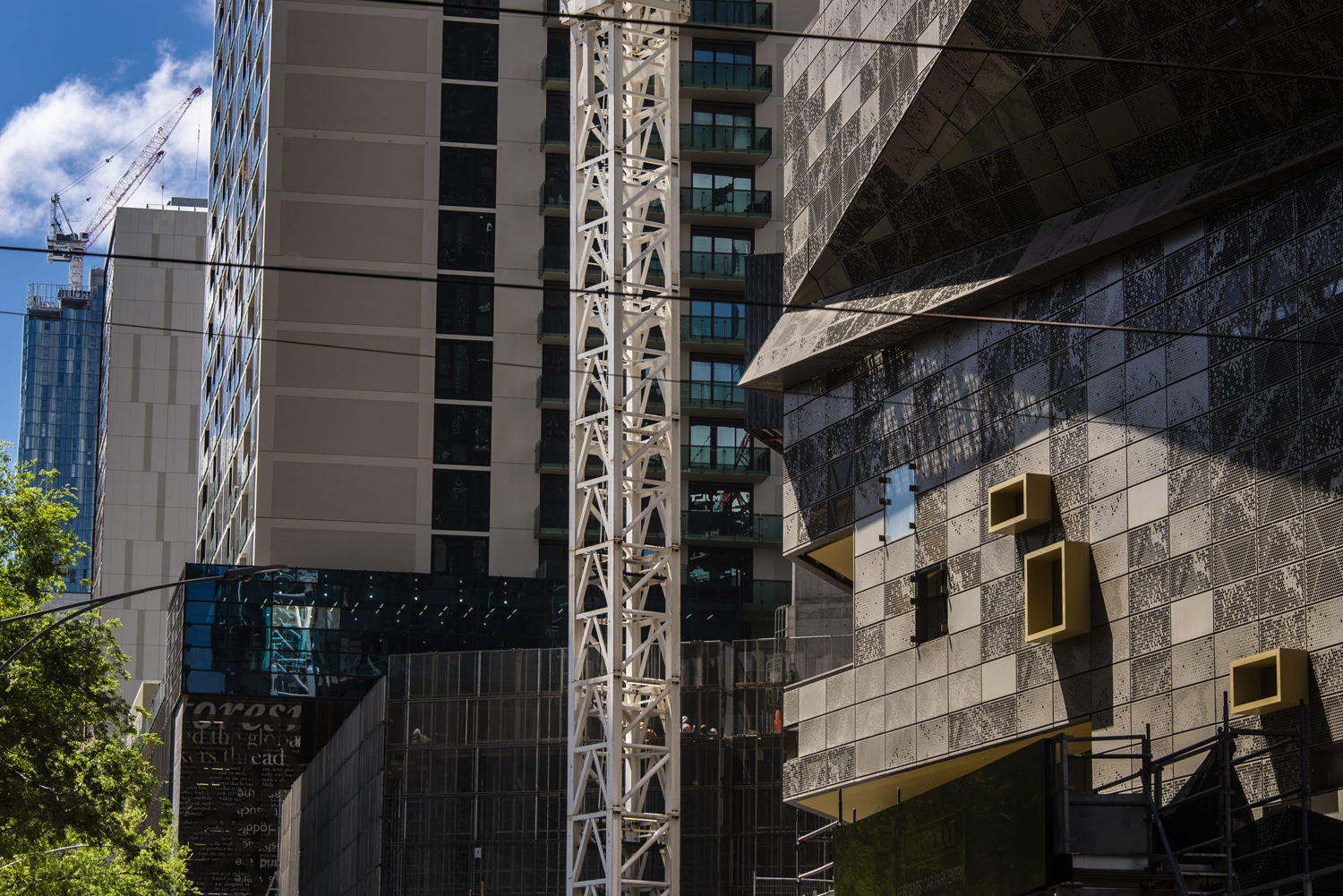 Colour photograph of the built city environment that keeps altering the landscape.