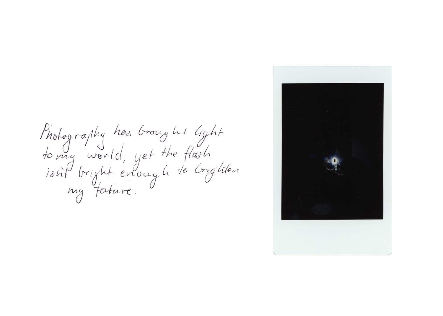 Text with Polaroid depicting a flash of light in darkened room with.