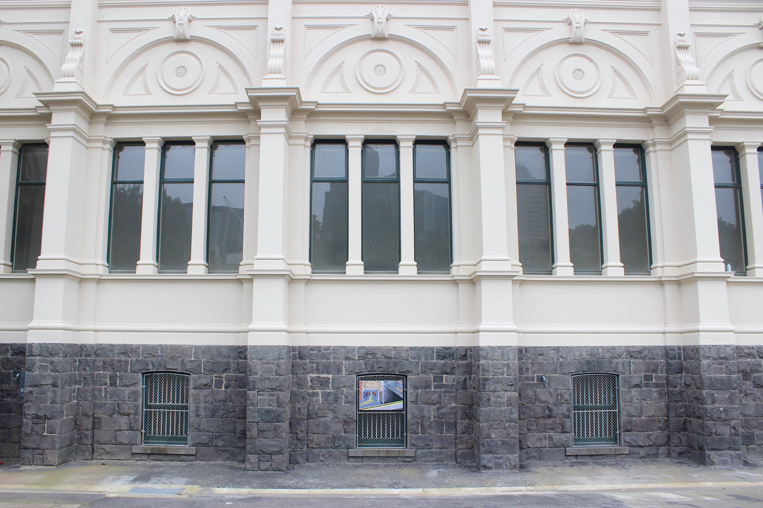 Installation view of painting hanging on the Royal Exhibition Building. 
