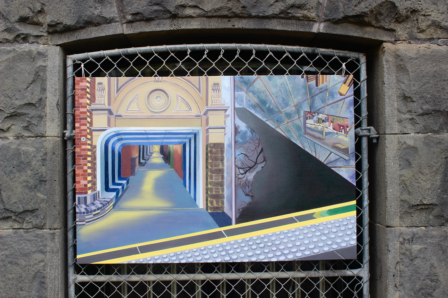 Close-up of painting tied to metal gate at base of the Royal Exhibition Building depicting features of the Royal Exhibition Building, a tram platform and blue striped seating from RMIT university. 