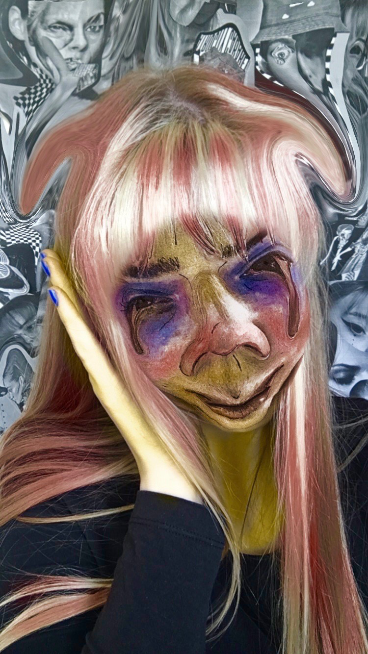 A digitally distorted deep fake portrait with highlighted colours of yellow on the skin, blue on the nails and under the eyes and red within the hair, cheeks and lips. 