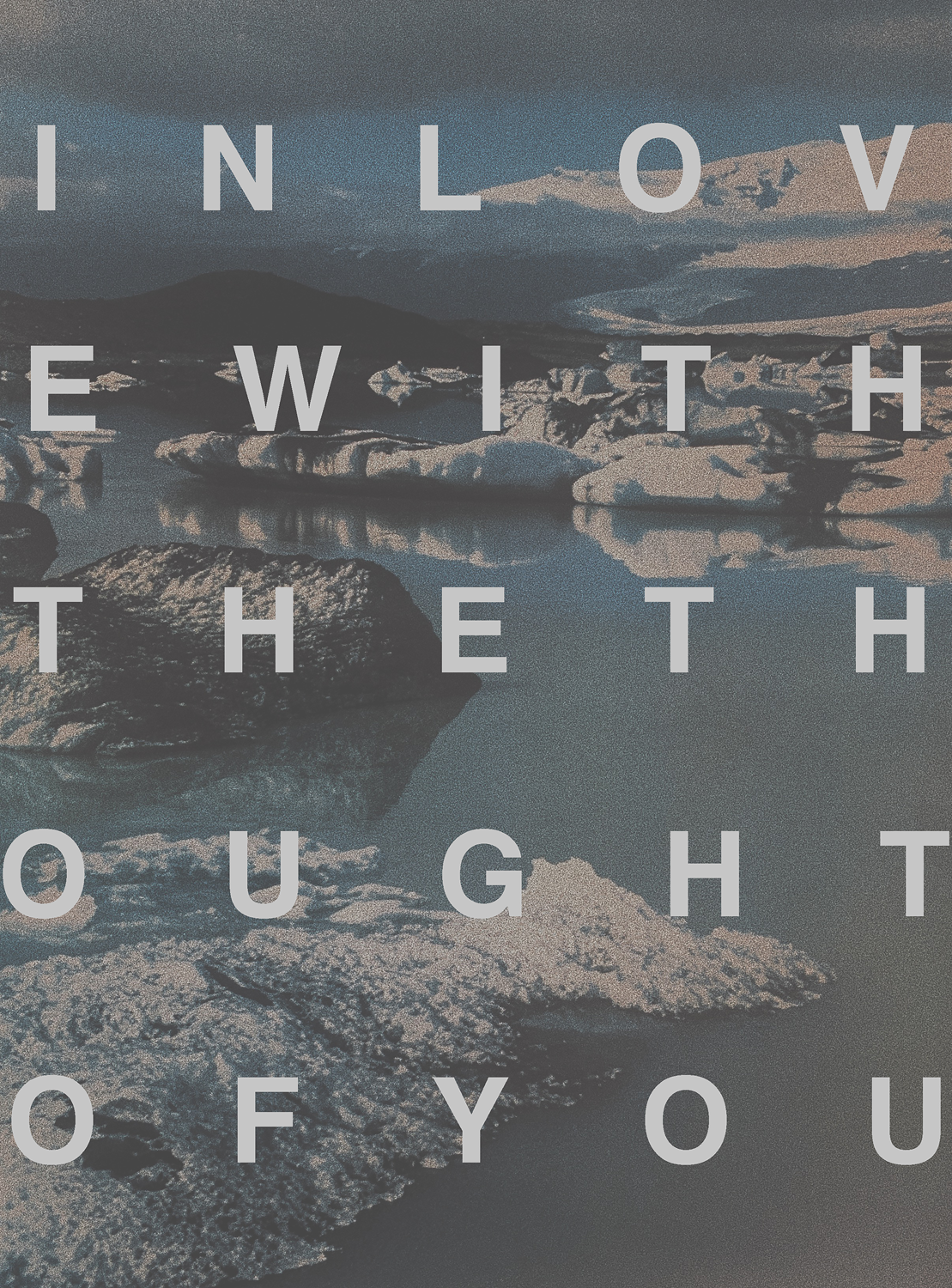 text layered on greyscale lake and mountain landscape