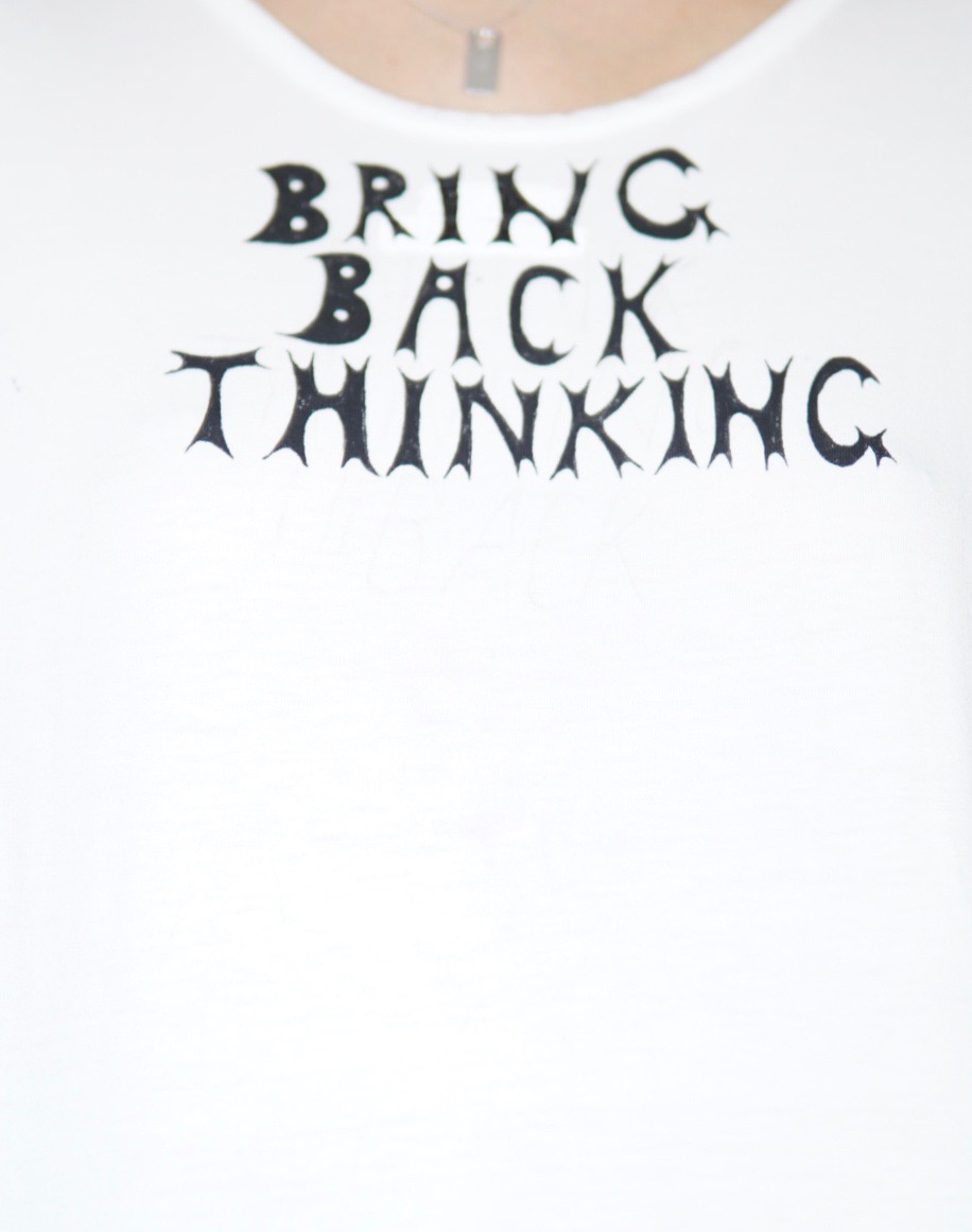 White shirt with writing saying 'Bring Back Thinking'