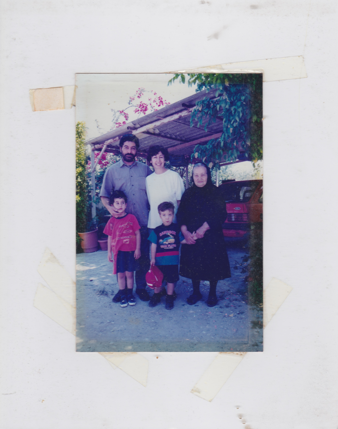 Colour photograph of archival image of artist's family.