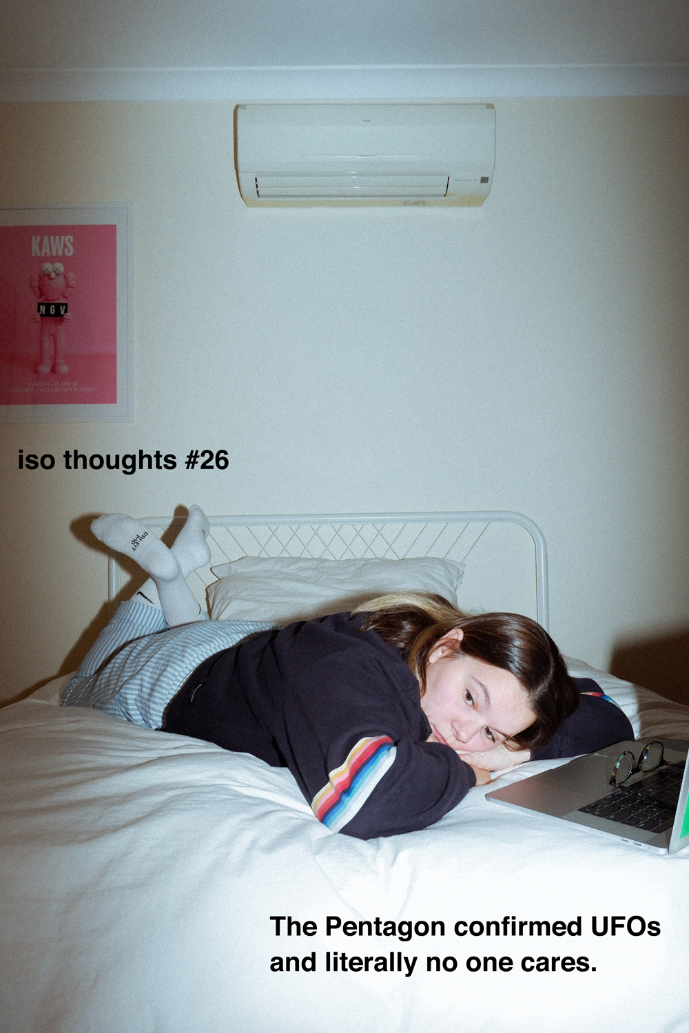 Colour photograph depicting young woman lying on bed with laptop. Text overlays the image.