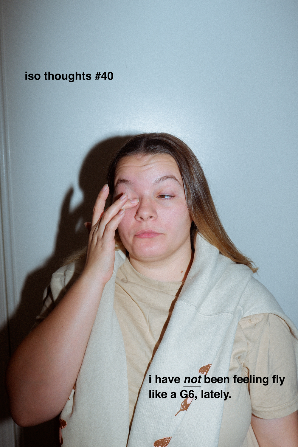 Colour photograph depicting portrait of young woman with hand to face. Text overlays the image.