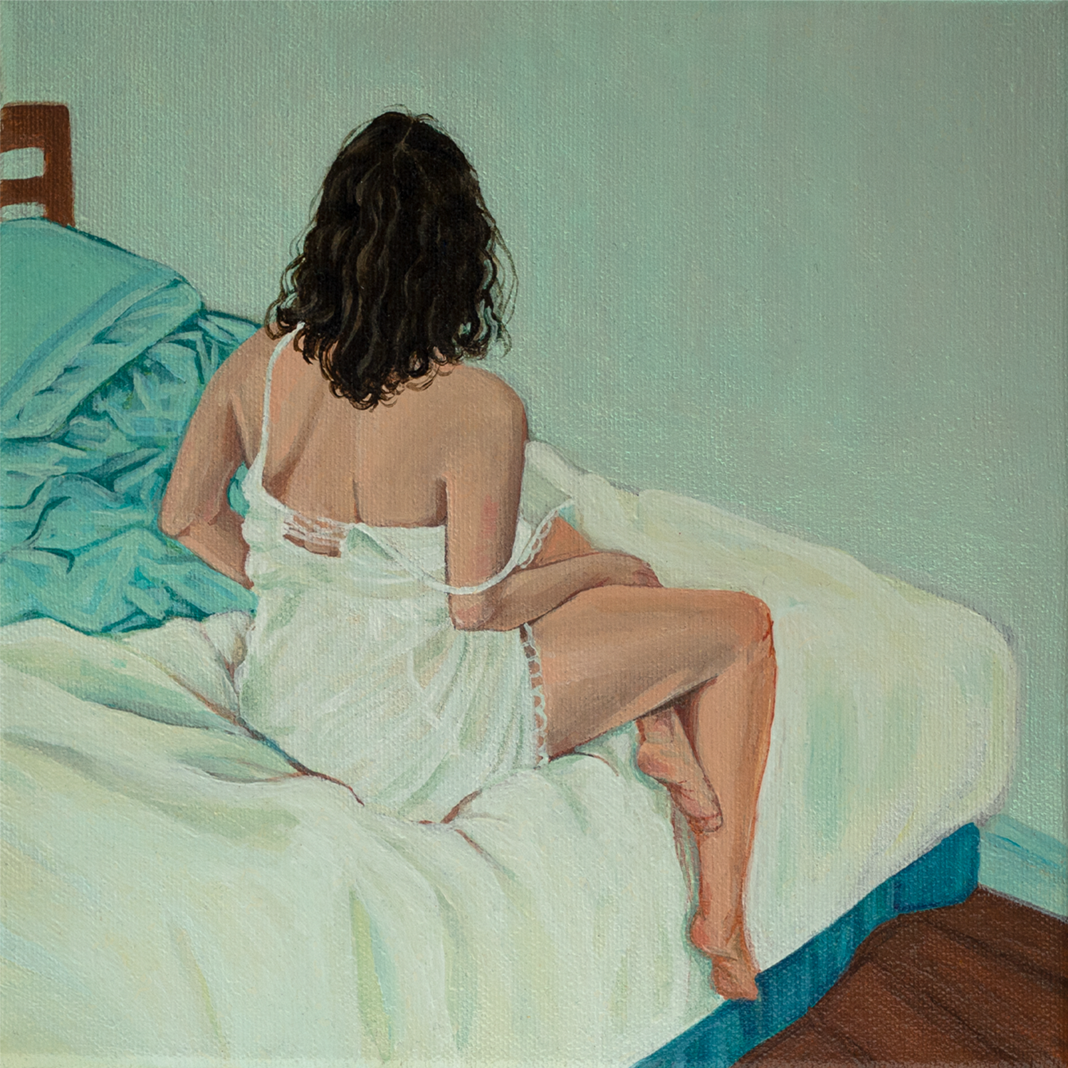 a solitary woman on a the edge of her bed turned away from us