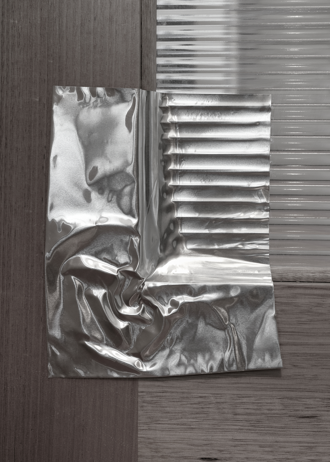 Aluminium pressed into the detail of glass door