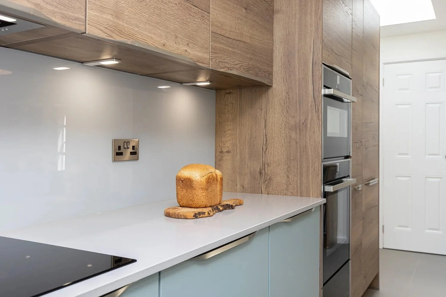 MODERN COASTAL BLUE & OAK KITCHEN IN KNIGHTSFIELD