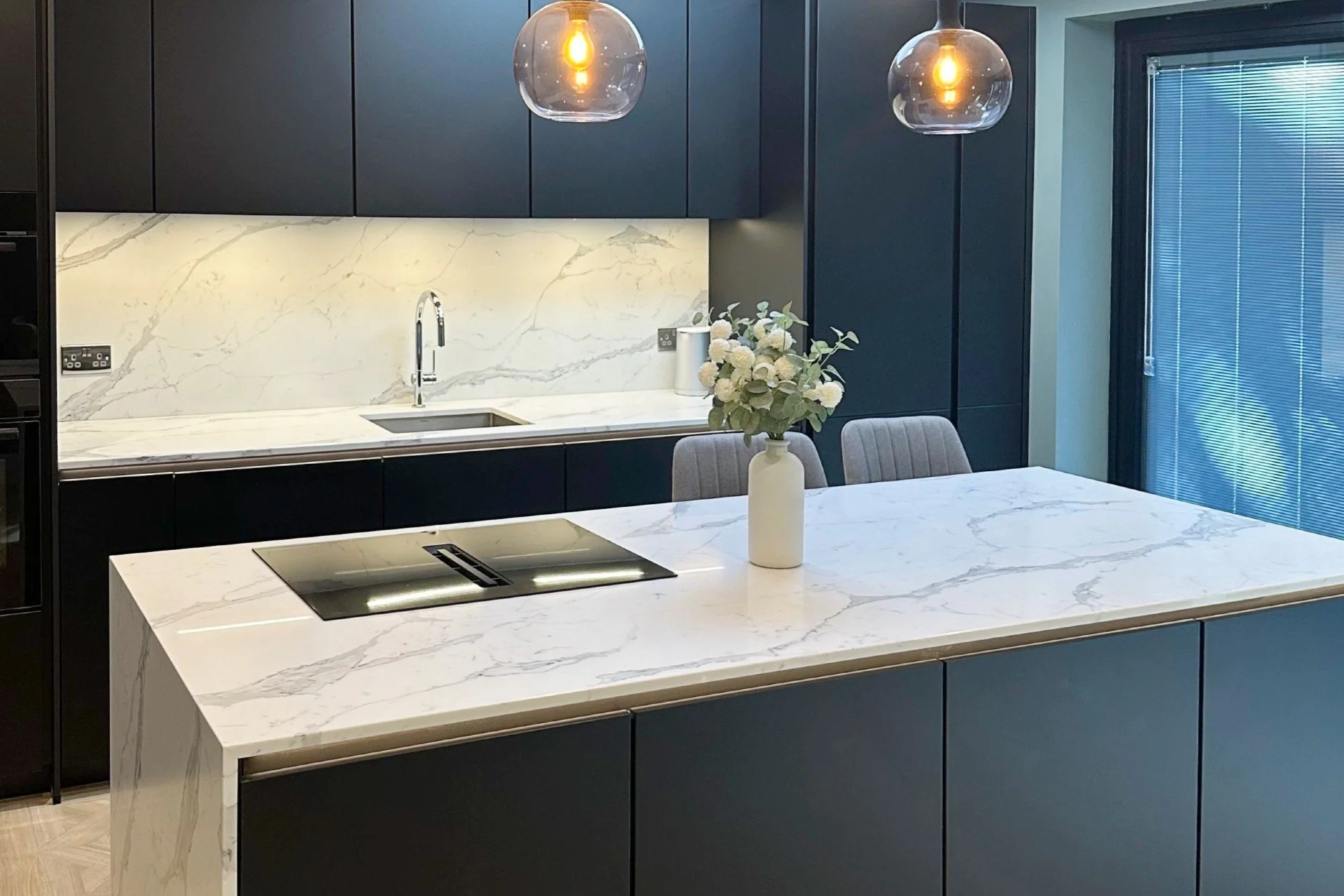 BLACK HANDLELESS KITCHEN IN HERTFORDSHIRE