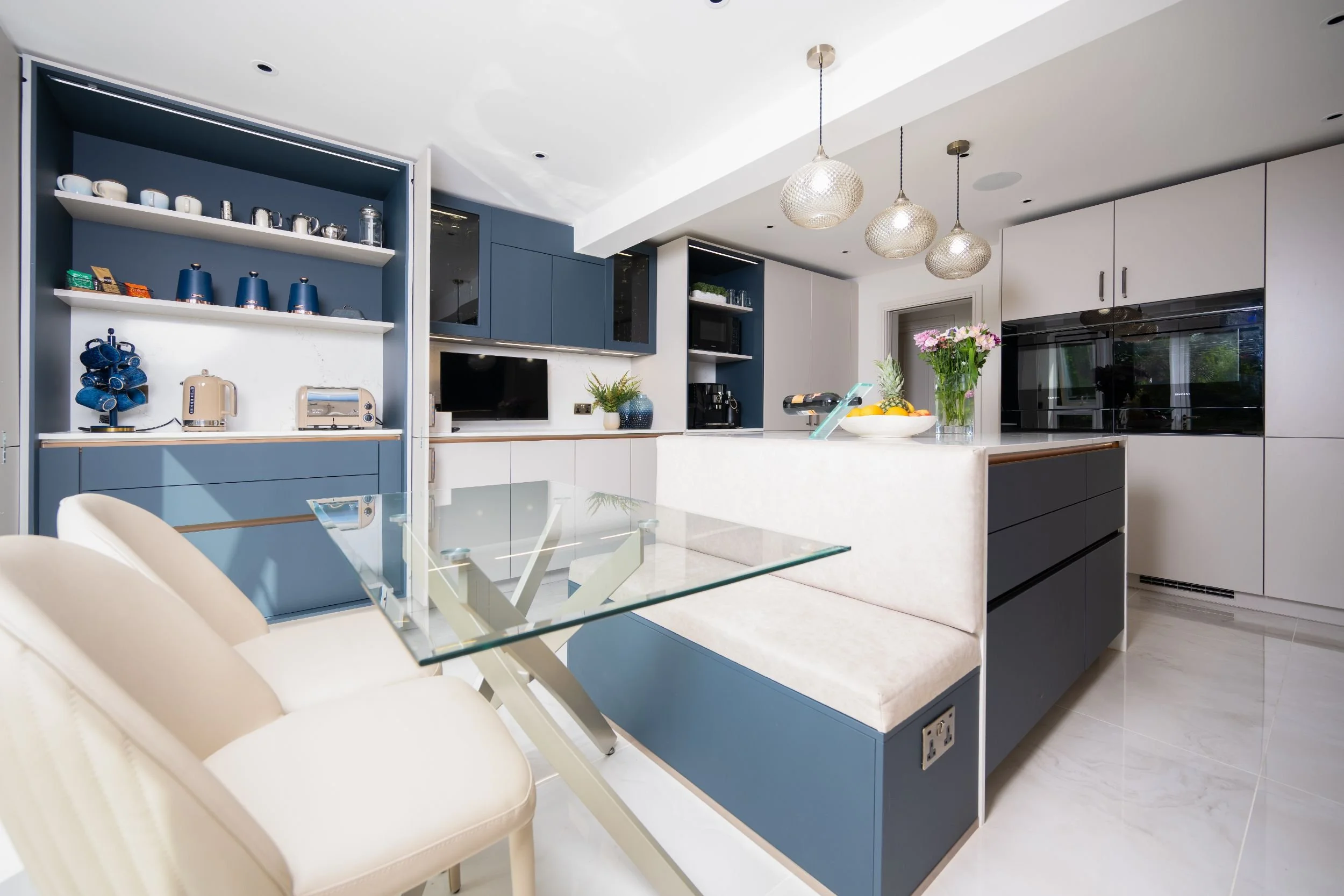 LIGHT NEUTRAL &amp; FJORD BLUE HANDLELESS KITCHEN IN HERTFORDSHIRE