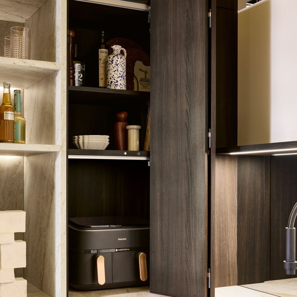 bifold doors on kitchen cupboard